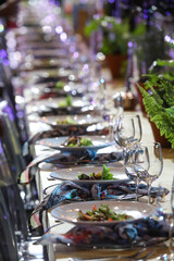 Starters set at a long table for an event. 