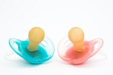 Blue and pink soothers