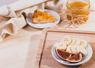 delicious banana and honey, apricot pie. selective focus. close up shot. wooden surface