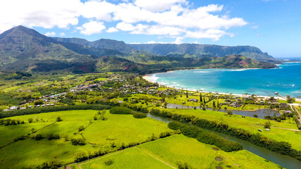 Aerial Hanalei Bay is the largest bay on the north shore of Kauaʻi island in Hawaii. The town of...