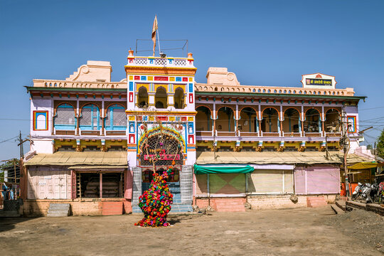 Brightly colored , freshly painted goddess Ambadevi temple with