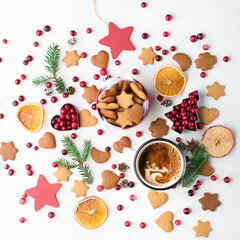 Fototapeta premium Christmas gift cookies and cup of coffee. Flat lay winter cozy Christmas holiday background. Xmas atmosphere.