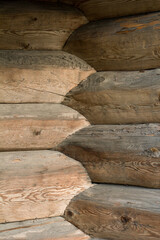 the corner of the house from logs of a large plan, hardwood