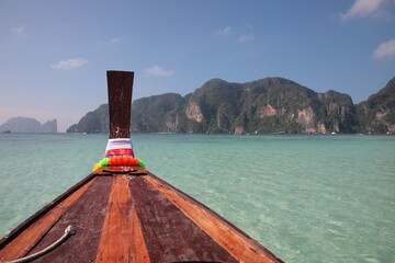 View of Longtail boat Sailing at the beautiful Tonsai bay in Phi Phi island,  krabi province,...