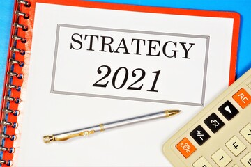 Strategy 2021 - text label in the planning folder. A promising approach for achieving a sustainable competitive advantage, searching for new opportunities in business and education.