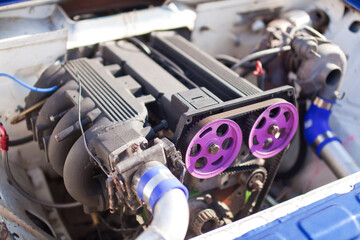 Sports motor intake elements close up on a sports car