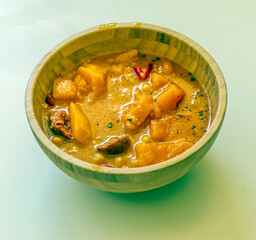 Chickpea and pumpkin stew surrounded by white background