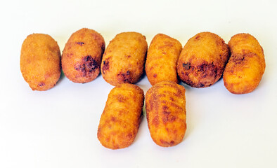 Croquettes surrounded by white background