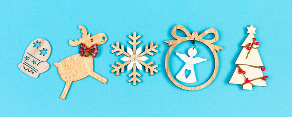 Banner top view of holiday ornament made of Christmas decorations on colorful background. New Year time concept with copy space