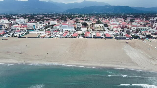 Lido Di Camaiore, Italy. Amazing aerial view of Tuscany coastline on a cloudy day