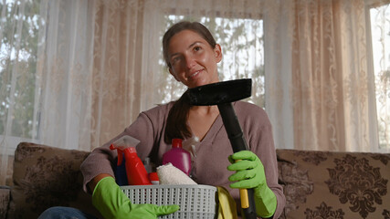 housemaid took supplies for cleaning the room