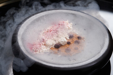 Dessert ice cream with syrup and cocoa powder, close-up