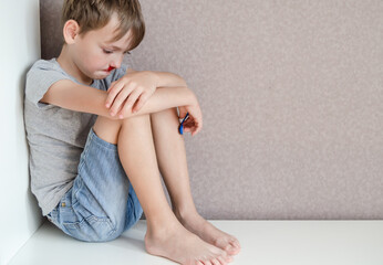 the child has nosebleed. disease, pressure or abuse concept with children
