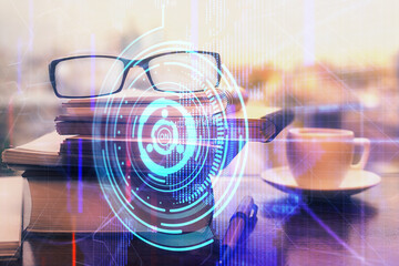 Data tech hologram with glasses on the table background. Concept of technology. Double exposure.
