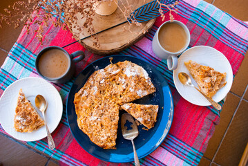 Cozy autumn breakfast with apple crumble pie.