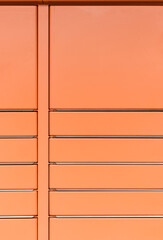 Fototapeta premium Post office box. Orange post box for rentals.