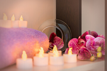 Flowers, candles, towels