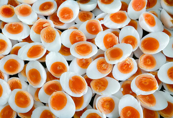 Hard boiled eggs cut in half, placed on top of each other, ready to serve.