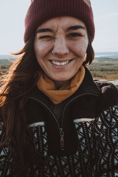 Portrait Of Smiling Woman Blinking