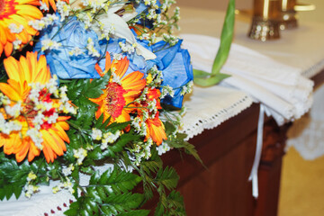 Colorful and beautiful bouquet of flowers for celebration in Christian church such as baptism, wedding or communion.
