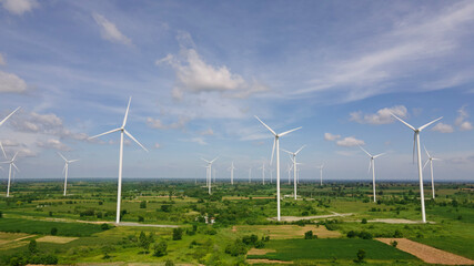 wind turbines plant for electric power production with blue sky ,clean energy concept