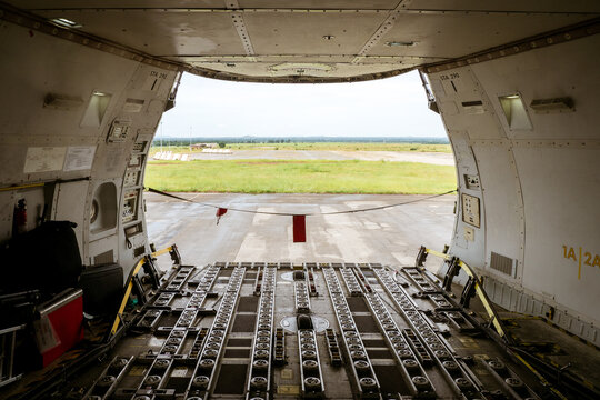 View of the big opening at the front of a Jumbo Jet freighter aircraft's main deck, after the nose cargo door has been opened completely