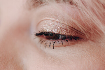 Ajar Eye of Beautiful Woman Portrait Closeup Photo