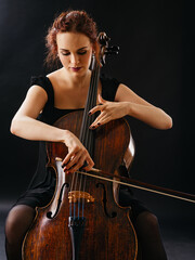 Beautiful female playing the cello © Yay Images