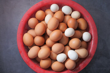 top view of eggs in a bowl on table 
