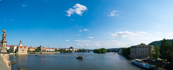 Prague day panorama and reflection in the river