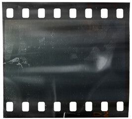 super grungy and dusty empty 35mm film strip isolated on white background, single dark film snip,...