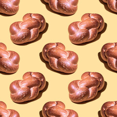 Seamless pattern with challah bread on yellow background. Minimal food pattern.