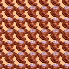 Seamless pattern with croissant on coral background.