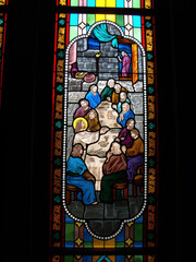 Bangkok, Thailand, September 23, 2015: The Last Supper of Jesus Christ with the Apostles in a stained glass window in the Cathedral of the Assumption. Bangkok