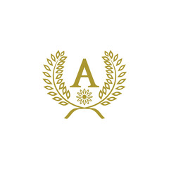 Obraz premium A letter with leaf and flower golden luxury logo design vector