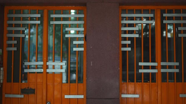 Entrance to the Numbers 129 and 127 From an Apartment Building