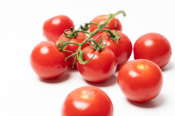 Close up small and tasty tomato shots