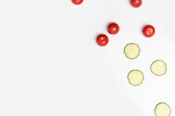 Cucumber slices and small tomatoes