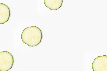 Cucumber slices, white background
