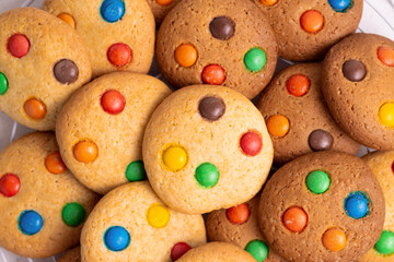 Fresh cookies with colorful chocolate droplets