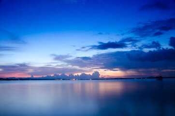 Red purple cloud Sunset lake background Dark red. Cloud Strom