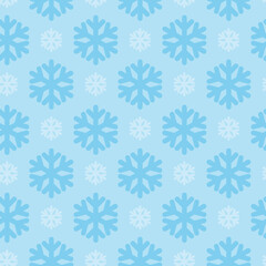 This is a seamless pattern of snowflakes on a blue background. Wrapping paper. Could be used for gift paper and Christmas, winter decorations.