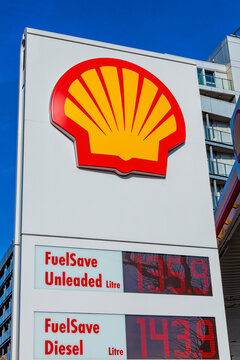 London, UK, February 26, 2012 : Shell logo advertising sign at a retail business service station garage in the city showing its petrol pump price stock photo