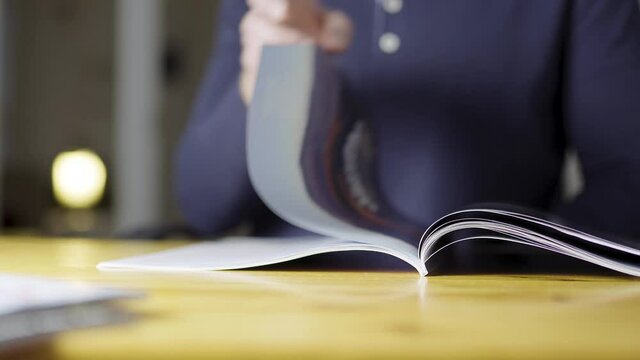 Man reading magazine and turning page. Glance through information and news. Print media concept. Male reader with newspaper.