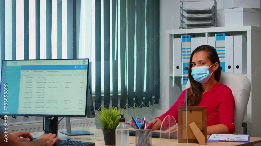 Poster people wearing face masks back at work in office with new normal. team working in workspace in perso