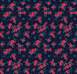 Floral pattern. Pretty flowers on dark blue background. Printing with small pink flowers. Ditsy print. Seamless vector texture. Spring bouquet.