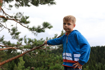 Serious Child On Mount Paaso in Karelia