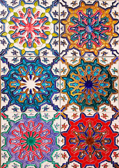 Detail of the traditional tiles from facade of old house. Decorative tiles.Portuguese traditional tiles. Floral ornament.