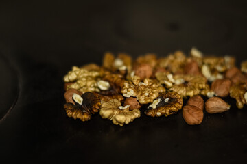 Assorted nuts on old kitchen. walnuts, hazelnuts, cashews, ...