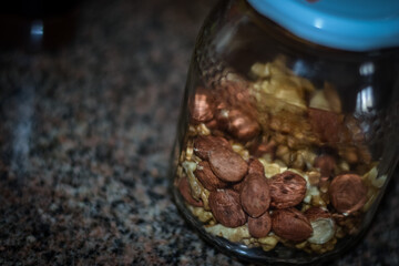 Assorted nuts on old kitchen. walnuts, hazelnuts, cashews, ...